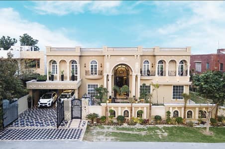 2 KANAL ORIGINAL FAISAL RASOOL SPANISH DESIGN BUNGALOW WITH BEAUTIFUL LAWN FOR SALE NEAR TO RAYA