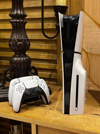 PS5 disc edition with 2 controllers. (Rarely used)