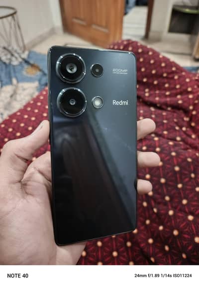 Redmi Note 13 Pro.  (0+3+0+3+4+9+6+1+1+0+0)
