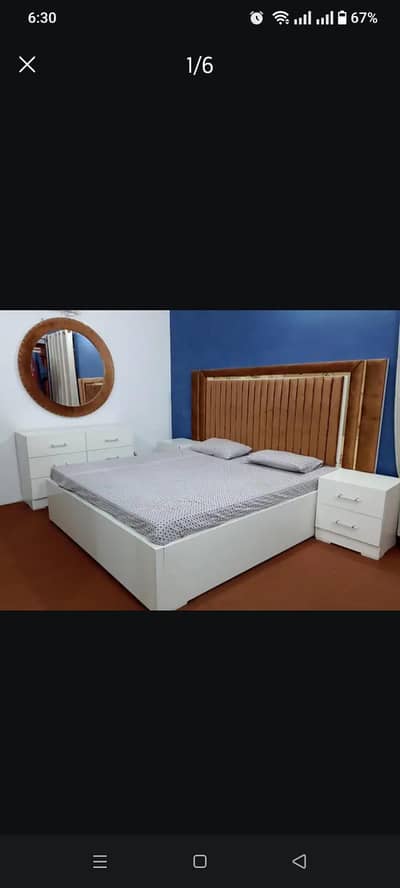 Bed room furniture set with mattress and pillows, neat and clean,