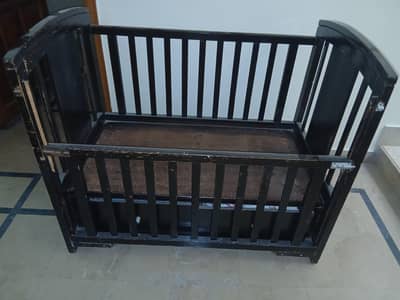 wooden oak baby cot with drawers and wheels