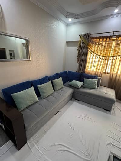 L shaped sofa with big spacious seats in good condition