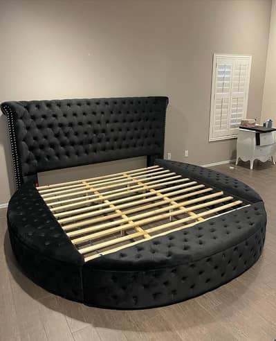 Round Black Master Bed with Storage