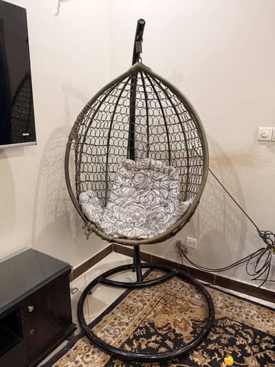 It’s a swing chair slightly used in a good condition with comfort
