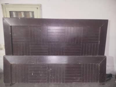 wooden bed with side tables and with dressing table