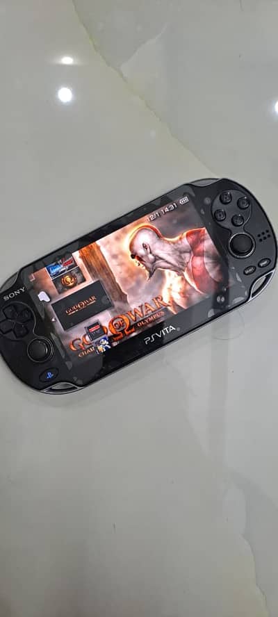 PS Vita OLED Jailbroken with 256gb card and games
