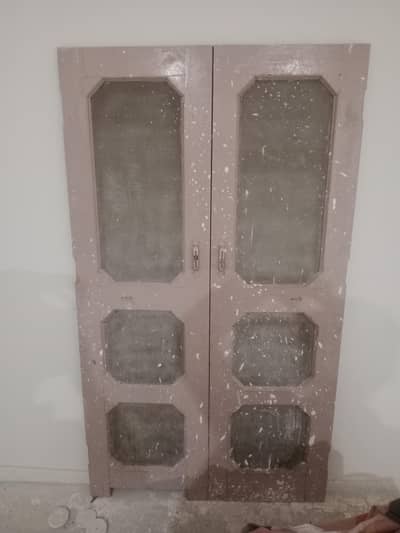 2 wooden windows and 2 wooden doors available. .