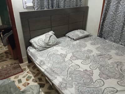 habit bed and two  side table