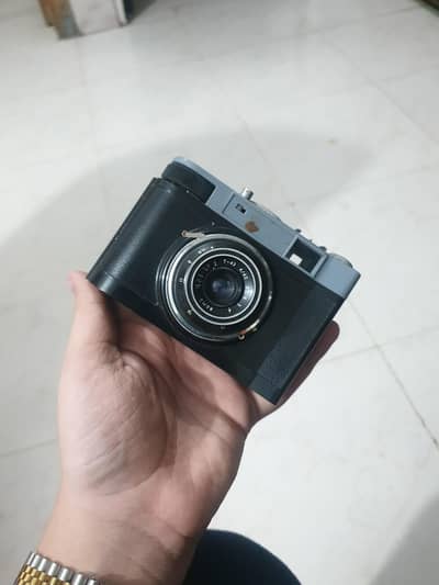 The item is a vintage LOMO Smena 8M 35mm film camera.