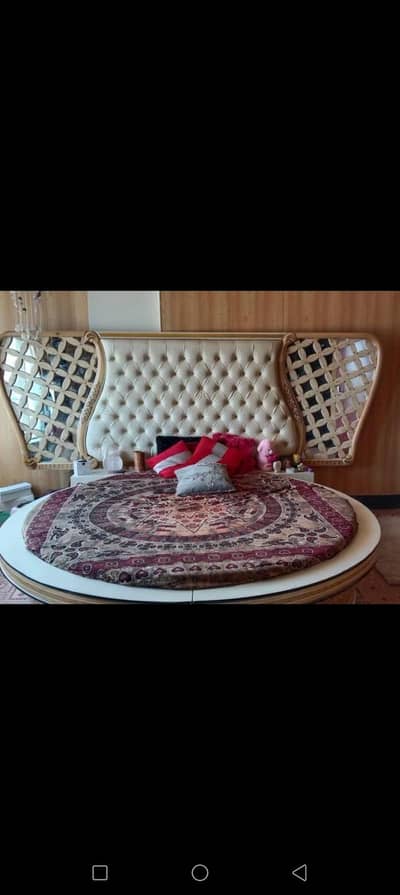 round Bed with dresing. and metres side tabales