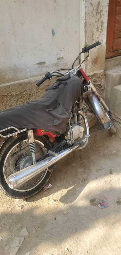Honda 125 karachi number  model 2013 complete  paper hai