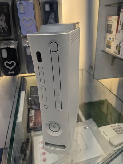 Xbox 360 with one controller