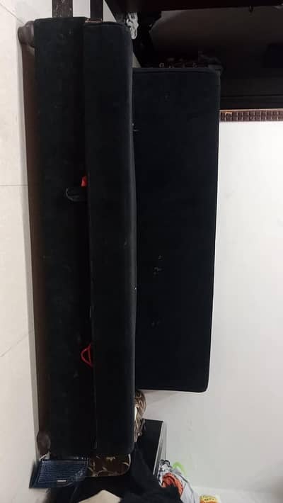 sofa combed with space under it