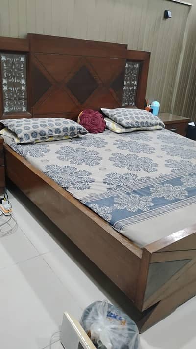Bed with side tables and mattress