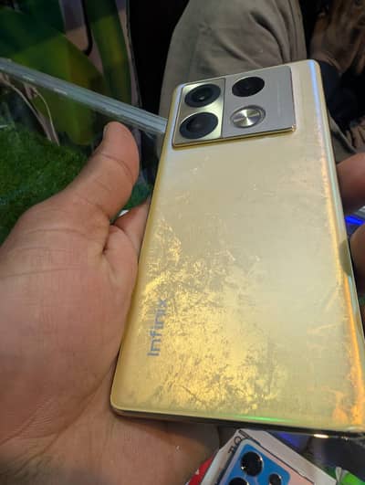 infinix note 40 pro 12 256 golden  wireless charger 70 whaâtt original