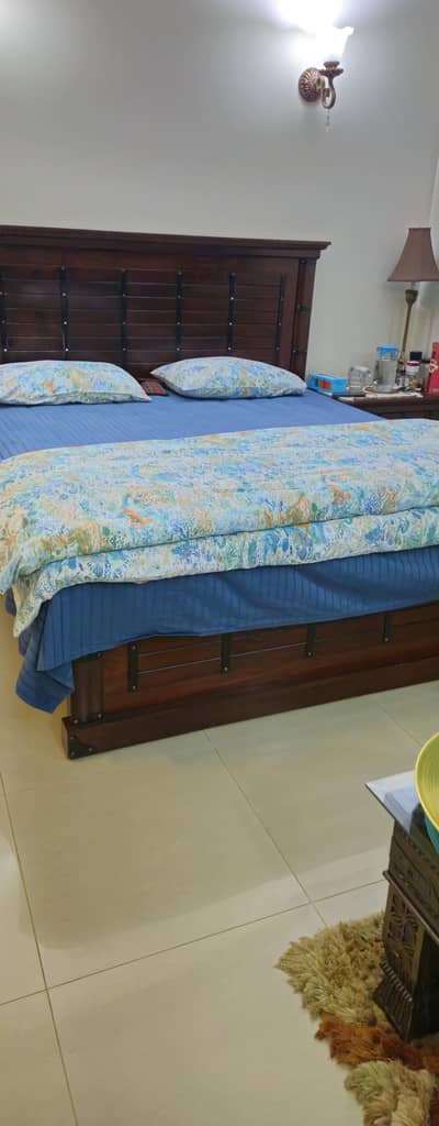 Bed with side and dressing table