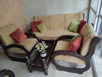 7 seater stylish wooden sofa with almost new velvet poshes