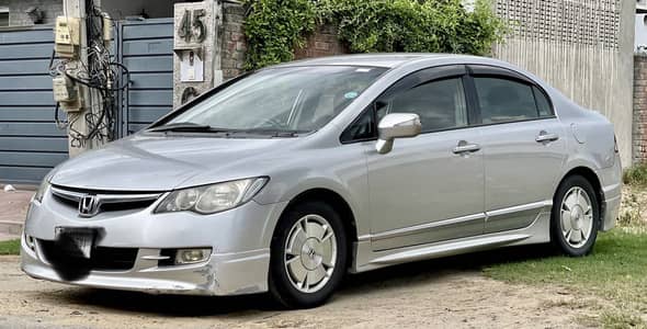 Civic Hybrid genuine milage / home used car