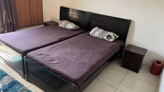 Single Beds with side tables