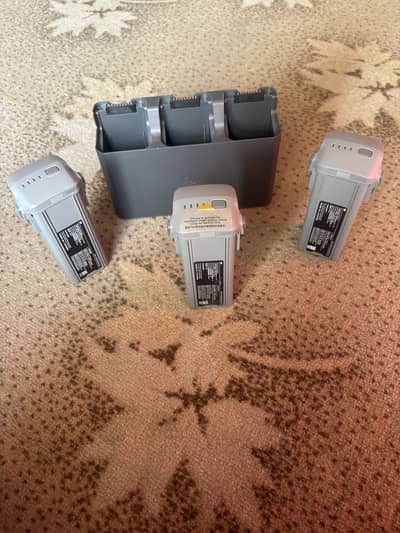 Dji mavic air  3 and 3s charging hub and 3 batteries brand new