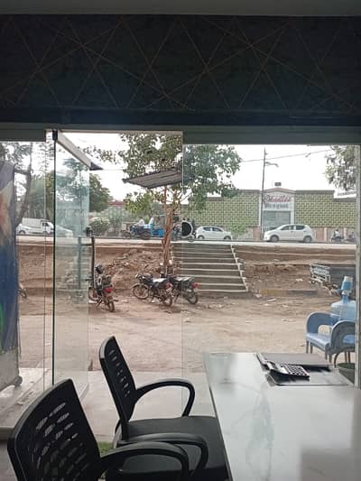 shop available on rent in Munir Bridge View, located on busy main road with attached basement ideal for maximum visibility and storage.
