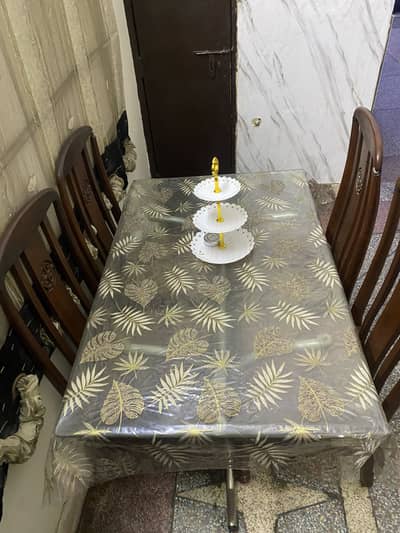 Dinning table four chairs