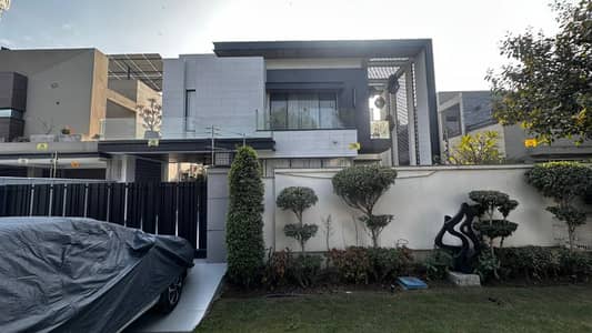 One Kanal Brand New Luxury Ultra-Modern Design Most Beautiful Fully Furnished Swimming Pool Bungalow 2 Servant Quarter In Basement For Sale At Prime Location Of DHA Lahore Near To Park Masjid & Commercial Market.