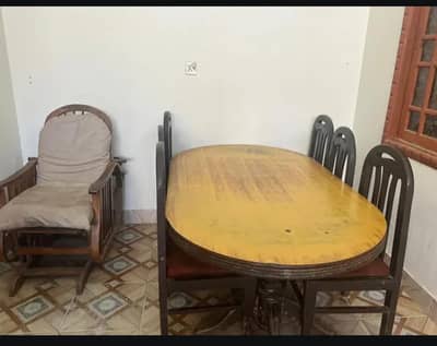 Dinning table with 6 chairs and also Rocking chair