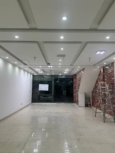 5.5 MARLA COMMERCIAL HALL AVAILABLE FOR RENT ON MAIN ROAD , MILLITARY ACCOUNT HOUSING SOCIETY COLLEGE ROAD LAHORE .