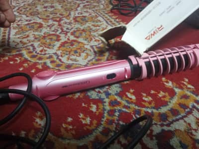 Hair straightener . stylish colour smooth result