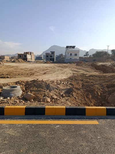 8 marla plot for sale on 100ft main road Block A Faisal hills