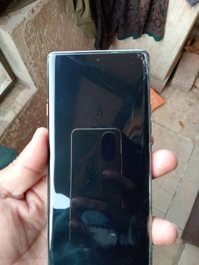 cracked screen but touch is ok,7 month warrenty,box and charger avl