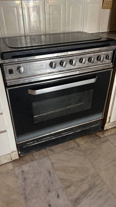 Gas oven with 5 burners