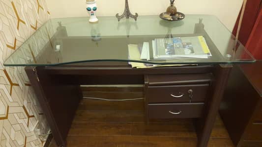 Office table made with solid wood heavy-duty glass on top with chair