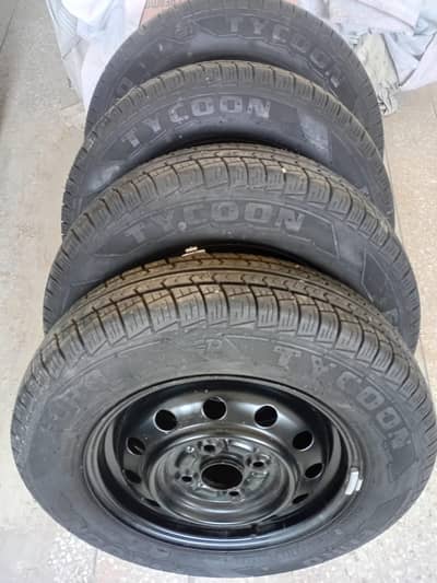 Selling 4 EURO TYCOON 145/80 R13 with Original Steel Rims