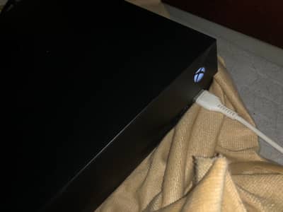 almost new xbox one x 1tb original with box