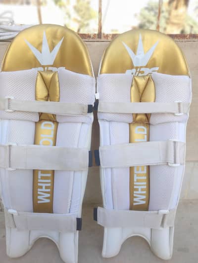 Mids white Gold batting pads. Almost new in condition 4-5 matches used