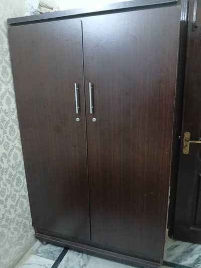 double door wood cupboard