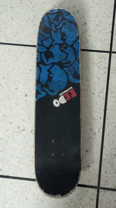 Redo Skateboard With Blue Cats on 52mm 95A Redo wheels