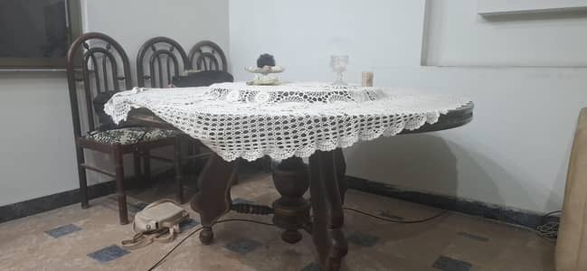 solid round table with 6 chairs