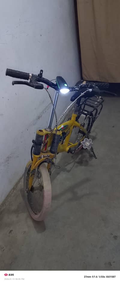 bicycle with t handle and rechargeable light/horn