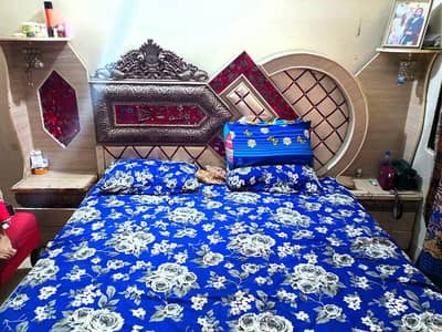 BED WITH CORNER CABINETS