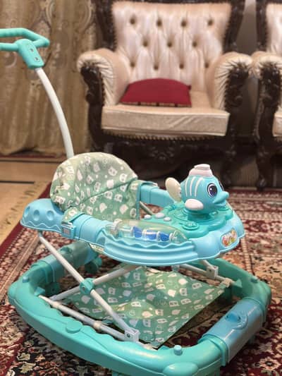 Baby Walker / Rocker Convertible  baby walker price negotiable