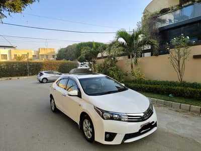 TOYOT COROLLA ALTIS GRANDE 1.8cc CVT MODEL 2016 ORIGINAL WHITE COLOR