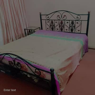 rought iron king size bed with spring mattress, side tables,. . .