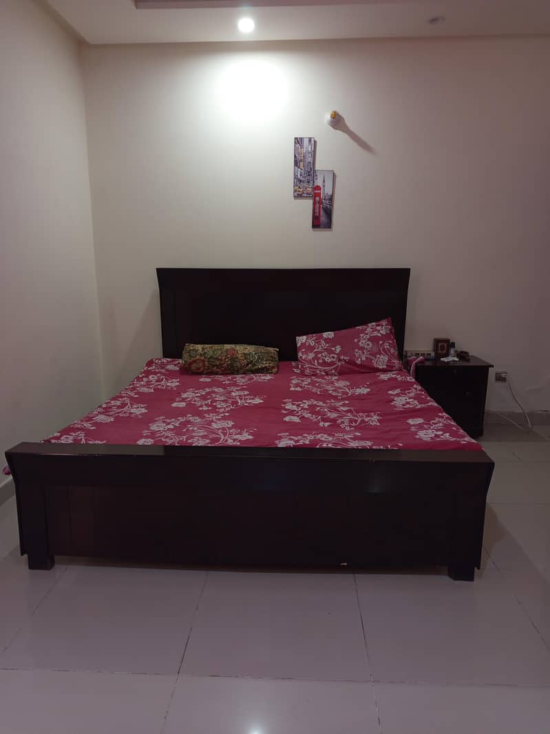 WOODEN BED WITH SIDETABLE 2