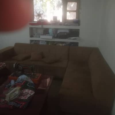 L-Shaped sofa in very good condition 03186050047