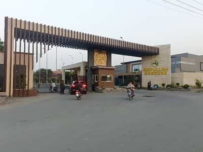 10 Marla Plot Available For Sale In Ayesha Block Abdullah Gardens Canal Road.