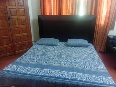 Bed along with side table and dressing table