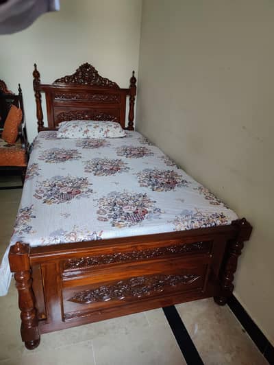 Wooden Chinioti 2 single beds new. . .